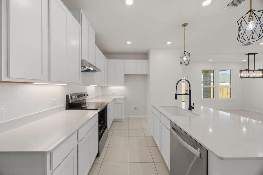Furnished interior view inside a new home in Mustang Valley, Manor (Image 7).