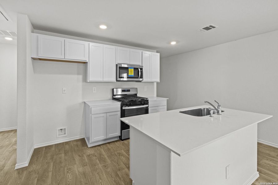 Furnished interior view inside a new home in Hickory Ridge, Elmendorf (Image 5).
