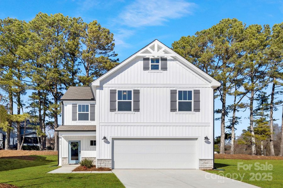 Front exterior of a new home in Eagles Crest, Pageland, SC, highlighting curb appeal (Image 1).