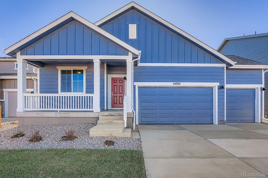 Front exterior of a new home in Wolf Creek Run, Strasburg, CO, highlighting curb appeal (Image 2). Front exterior of a new home in Wolf Creek Run, Strasburg, CO, highlighting curb appeal (Image 2).