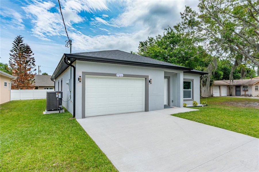 Front exterior of a new home in , Daytona Beach, FL, highlighting curb appeal (Image 29). Front exterior of a new home in , Daytona Beach, FL, highlighting curb appeal (Image 29).