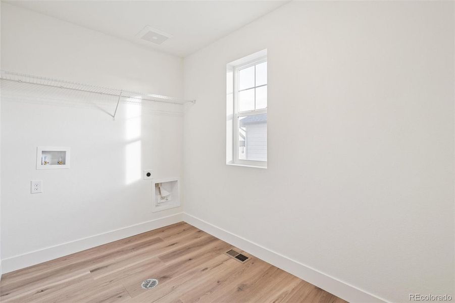 Spacious, unfurnished interior of a new home in Windsong, Thornton (Image 19).