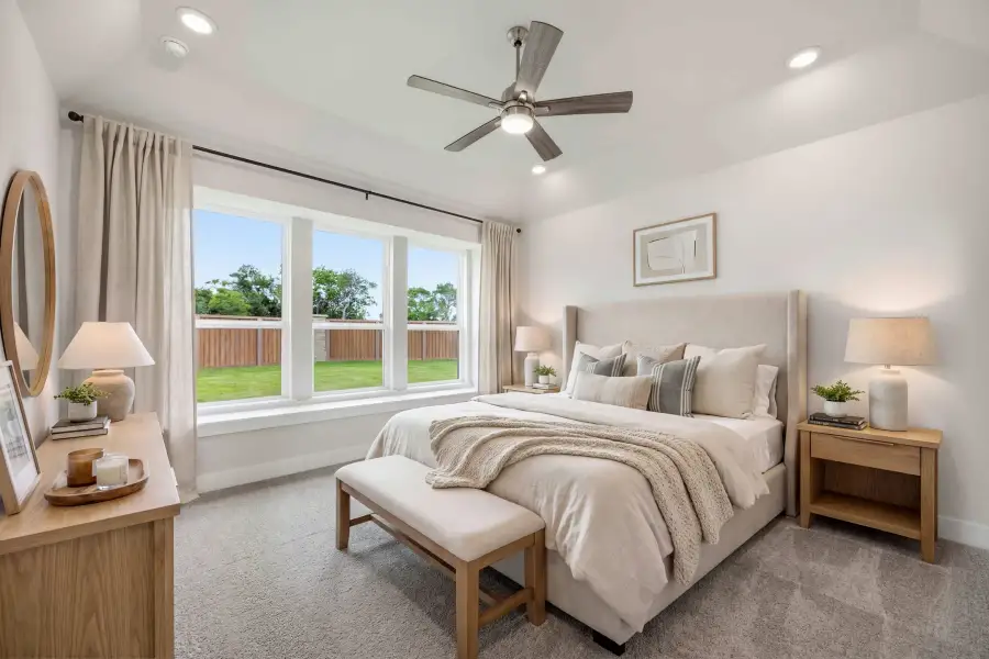 Furnished interior view inside a new home in Ellwood, Iowa Colony (Image 13).