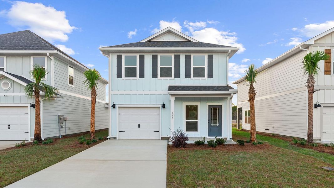Front exterior of a new home in Colonial East, Panama City Beach, FL, highlighting curb appeal (Image 2).