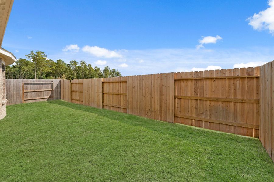 Exterior details and patio area of a home in The Trails, New Caney (Image 24). Exterior details and patio area of a home in The Trails, New Caney (Image 24).
