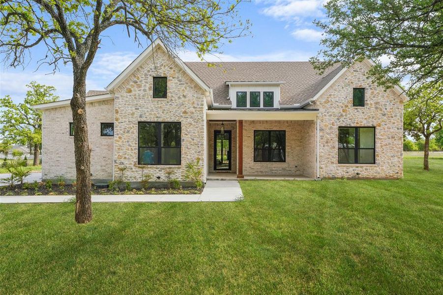 Front exterior of a new home in , Weatherford, TX, highlighting curb appeal (Image 1). Front exterior of a new home in , Weatherford, TX, highlighting curb appeal (Image 1).