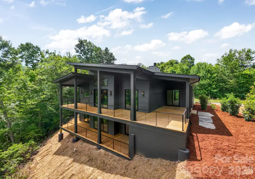 Exterior details and patio area of a home in , Waynesville (Image 3).