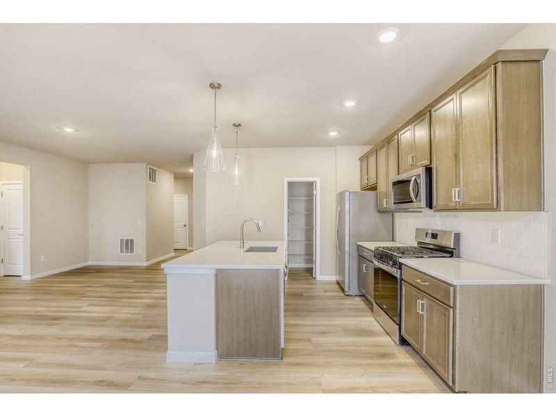 Furnished interior view inside a new home in Farmstead, Berthoud (Image 11).