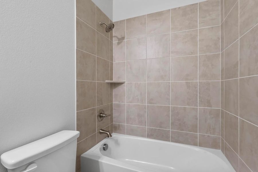 Representative furnished interior of a home built from the Garrison I by Cheldan Homes in Stoneview, Glen Rose (Image 35).