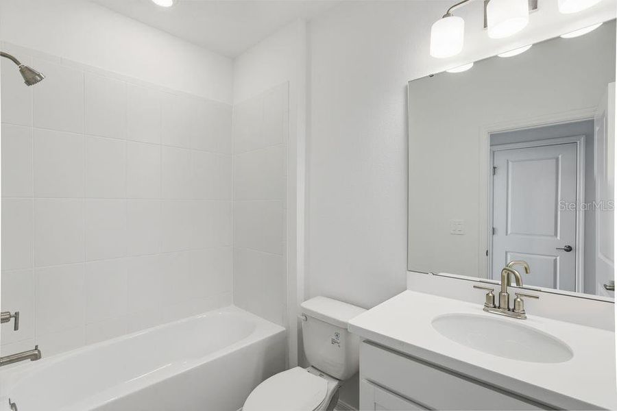 Furnished interior view inside a new home in Center Lake Ranch Community Group Page, St. Cloud (Image 38).