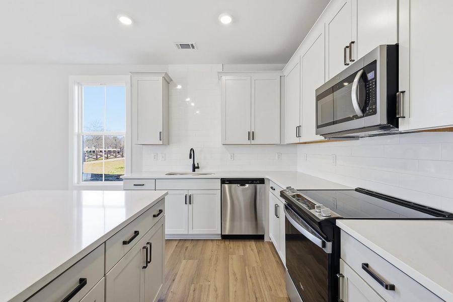 Furnished interior view inside a new home in Wildflower, Chattanooga (Image 6). Furnished interior view inside a new home in Wildflower, Chattanooga (Image 6).