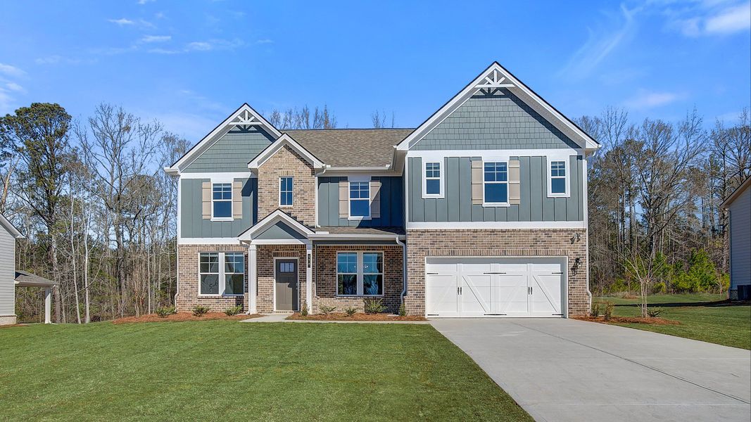 Representative exterior photo of a completed home built from the McKinley II by DRB Homes in Copperfield, Locust Grove, GA (Image 21).