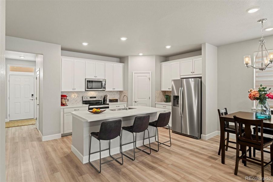 Furnished interior view inside a new home in Murphy Creek, Aurora (Image 35).