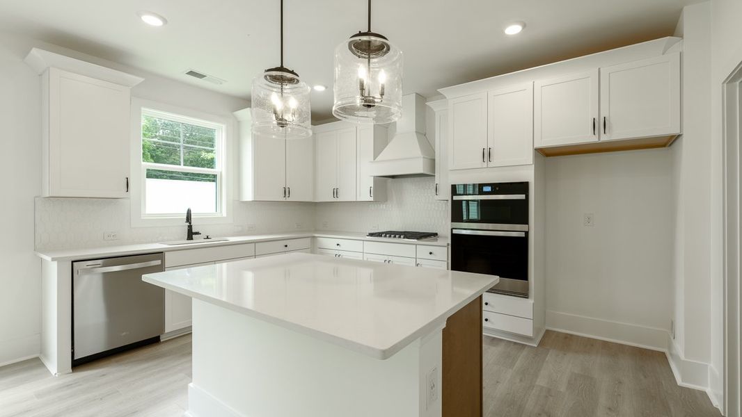 Representative furnished interior of a home built from the Hanover by D.R. Horton in The Village at Sandy Plains, Marietta (Image 6).