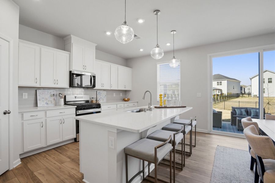 Furnished interior view inside a new home in Waxhaw Landing, Monroe (Image 12).