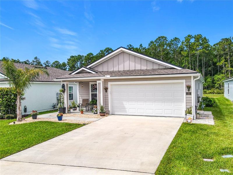 Front exterior of a new home in , Bunnell, FL, highlighting curb appeal (Image 1). Front exterior of a new home in , Bunnell, FL, highlighting curb appeal (Image 1).