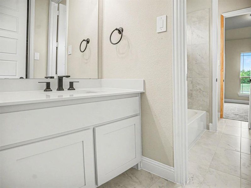 Furnished interior view inside a new home in Sagebrush Addition, Midlothian (Image 10). Furnished interior view inside a new home in Sagebrush Addition, Midlothian (Image 10).