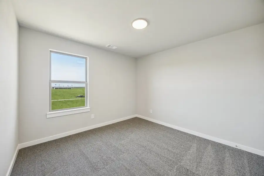 Representative unfurnished interior of a home built from the The Elm by Lillian Custom Homes in Hickory Hill, Sherman (Image 34).