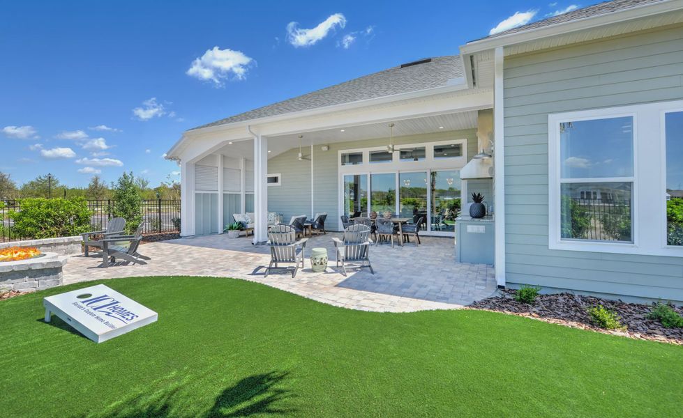 Front exterior of a new home in Oakmont, Gainesville, FL, highlighting curb appeal (Image 21).