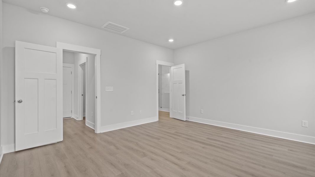 Accomplished design meets restful elegance in this exclusive primary suite by DRB Homes