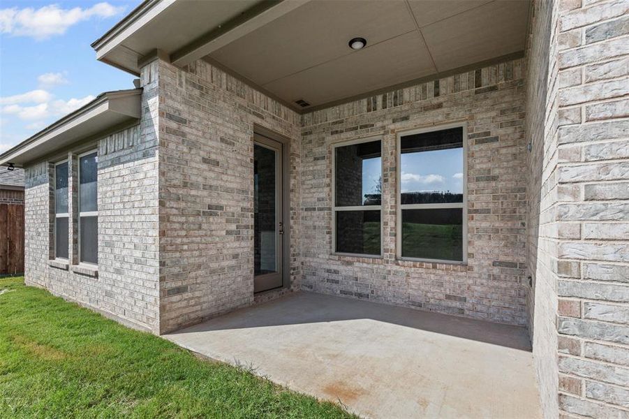 Exterior details and patio area of a home in , Springtown (Image 2).