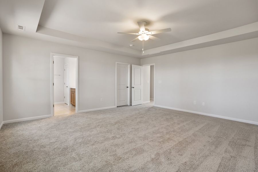 Spacious, unfurnished interior of a new home in Cambridge Reserve, Angier (Image 27).