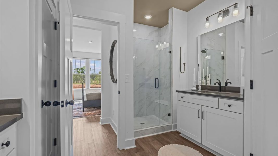 Highly functional and elegant en-suite with a tiled walk-in shower and refined finishes at Barton Hollow Highly functional and elegant en-suite with a tiled walk-in shower and refined finishes at Barton Hollow