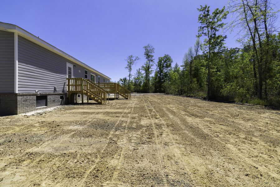 Exterior details and patio area of a home in , Cross (Image 30). Exterior details and patio area of a home in , Cross (Image 30).