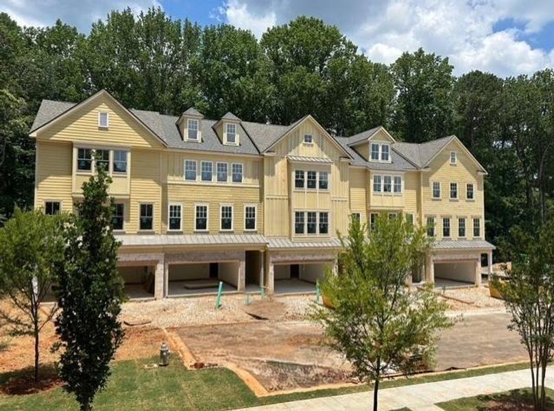 Front exterior of a new home in Devin's Shire, Kennesaw, GA, highlighting curb appeal (Image 19).