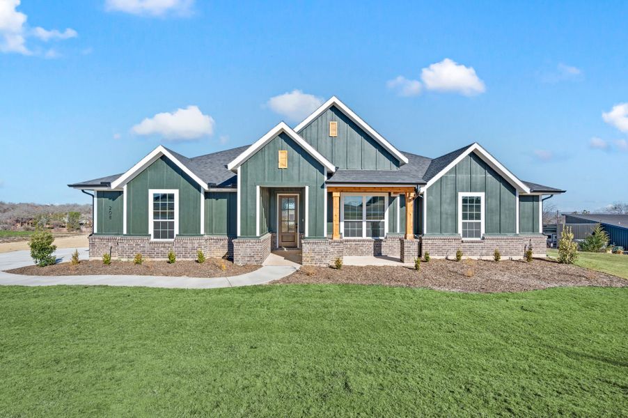 Representative exterior photo of a completed home built from the Sophia by Our Country Homes in Rocky Top Ranch, Reno, TX (Image 6). Representative exterior photo of a completed home built from the Sophia by Our Country Homes in Rocky Top Ranch, Reno, TX (Image 6).