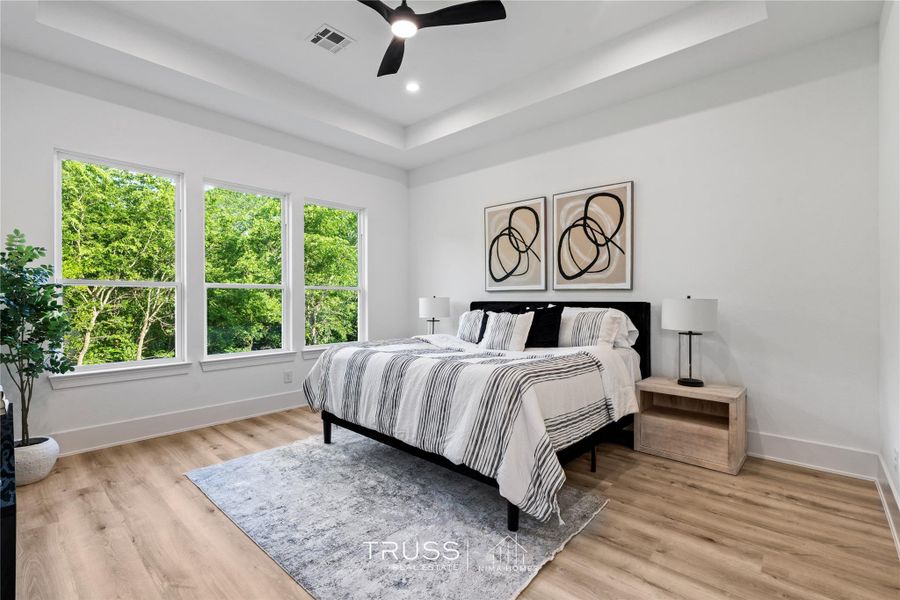 Designed for tranquility, this space balances scale and warmth, offering ample room for both rest and reflection.