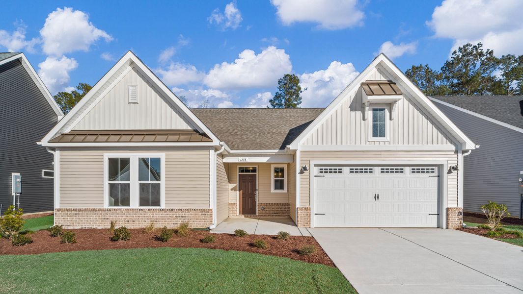 Front exterior of a new home in Coastal Club of the Carolinas, Calabash, NC, highlighting curb appeal (Image 16).