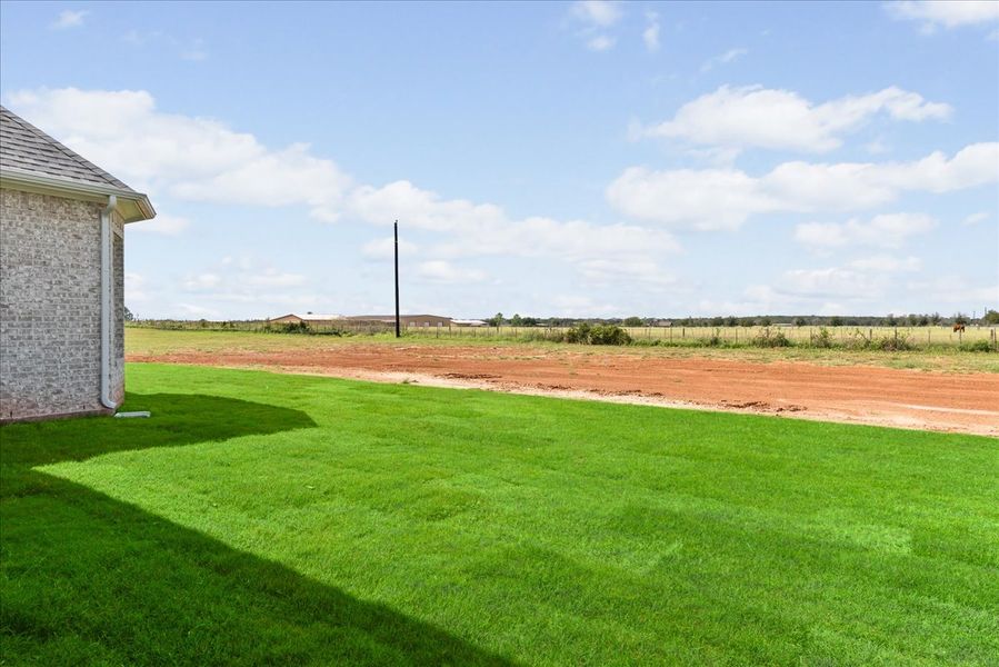 Representative exterior photo of a completed home built from the The Wellington II by Doug Parr Custom Homes in Monarch Manor, Poolville, TX (Image 23).