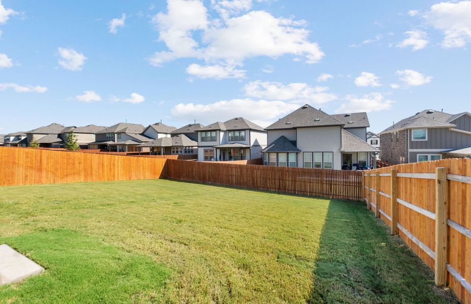 Exterior details and patio area of a home in Saddleback at Santa Rita Ranch, Liberty Hill (Image 29).