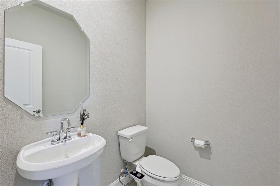 Bathroom with sink and toilet