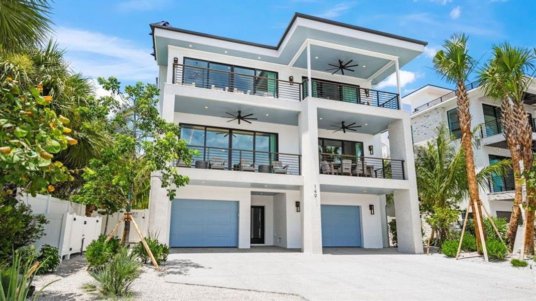 Front exterior of a new home in , Sarasota, FL, highlighting curb appeal (Image 16). Front exterior of a new home in , Sarasota, FL, highlighting curb appeal (Image 16).
