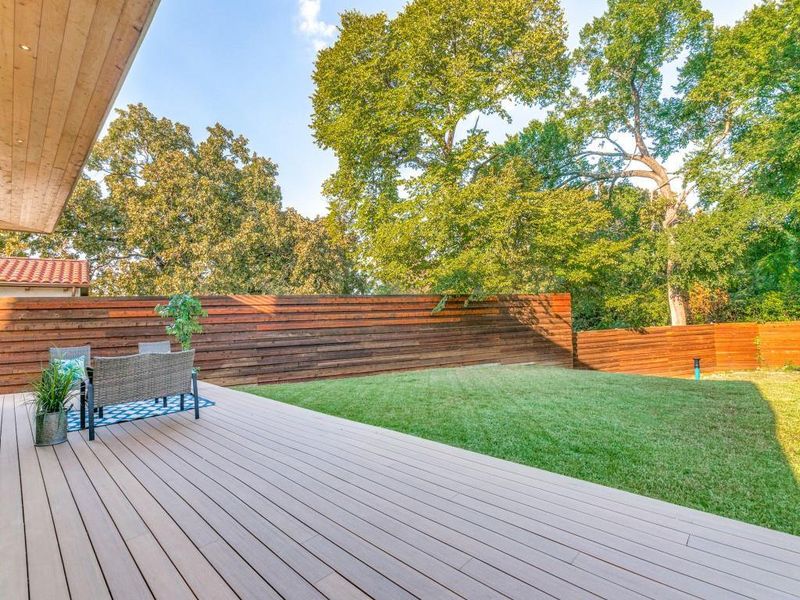 Huge Backyard Deck thats partially covered Huge Backyard Deck thats partially covered