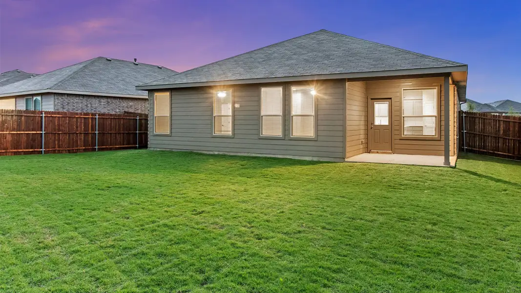 Exterior details and patio area of a home in Bluestem, Rhome (Image 2).