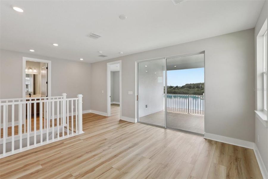 Spacious, unfurnished interior of a new home in Lagoon Residences at Epperson, Wesley Chapel (Image 49).