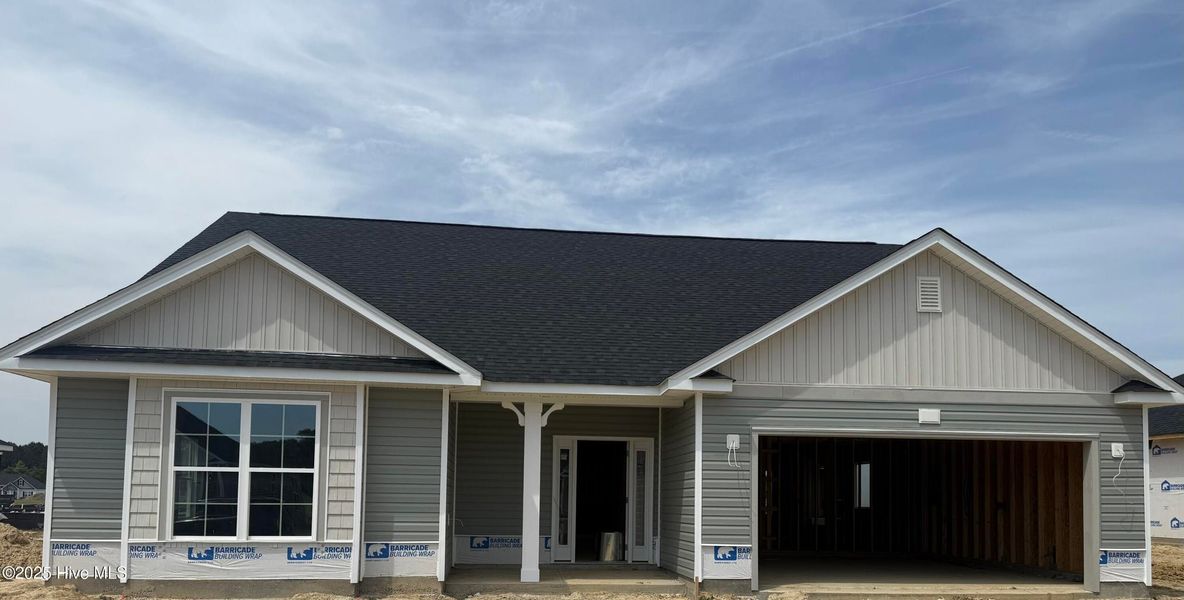 Front exterior of a new home in Summer Place, Grimesland, NC, highlighting curb appeal (Image 2). Front exterior of a new home in Summer Place, Grimesland, NC, highlighting curb appeal (Image 2).