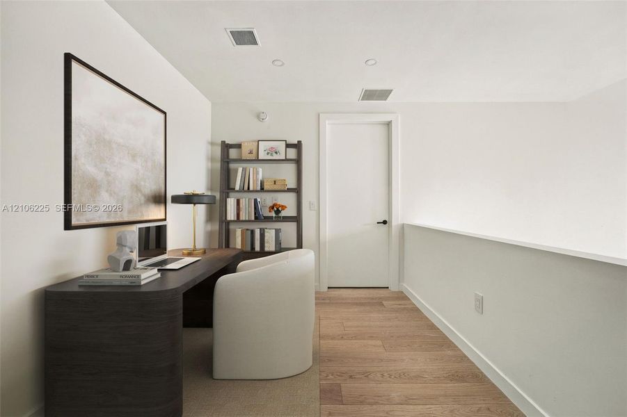 Wood-finish flooring, recessed lighting, and a solid-core interior door with matte black hardware Wood-finish flooring, recessed lighting, and a solid-core interior door with matte black hardware