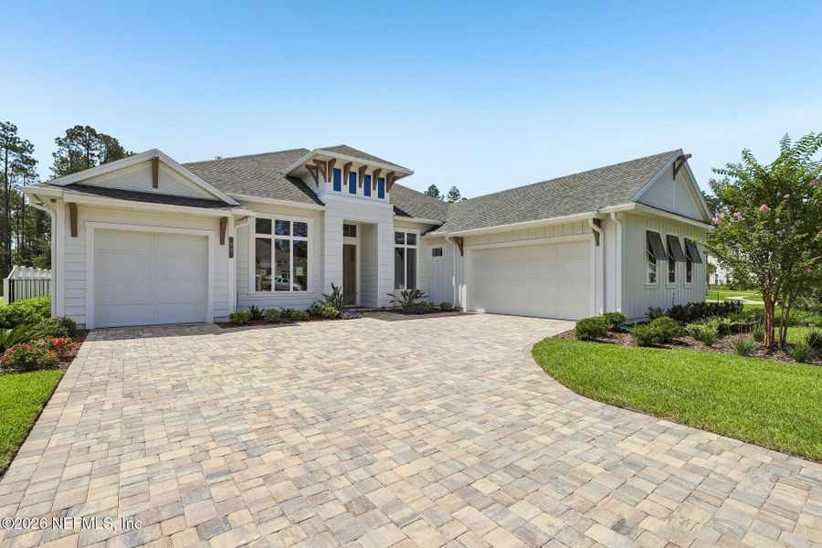 Front exterior of a new home in SilverLeaf, St. Augustine, FL, highlighting curb appeal (Image 2).