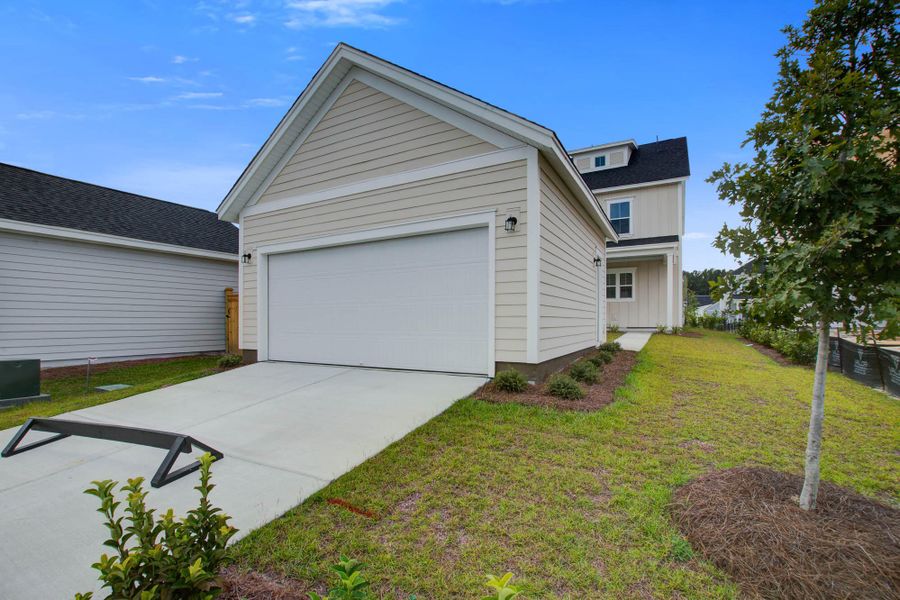 Exterior details and patio area of a home in Midtown at Nexton, Summerville (Image 2). Exterior details and patio area of a home in Midtown at Nexton, Summerville (Image 2).