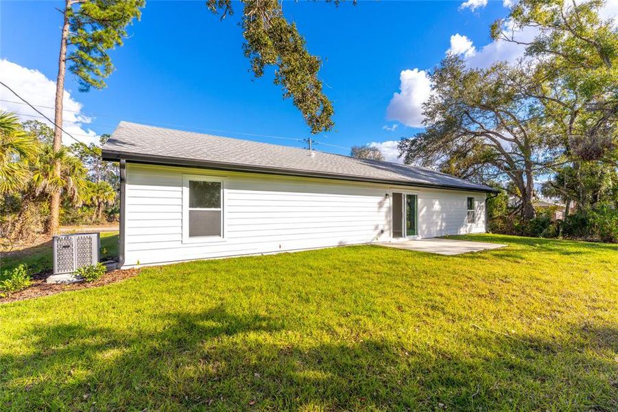 Exterior details and patio area of a home in , North Port (Image 29).