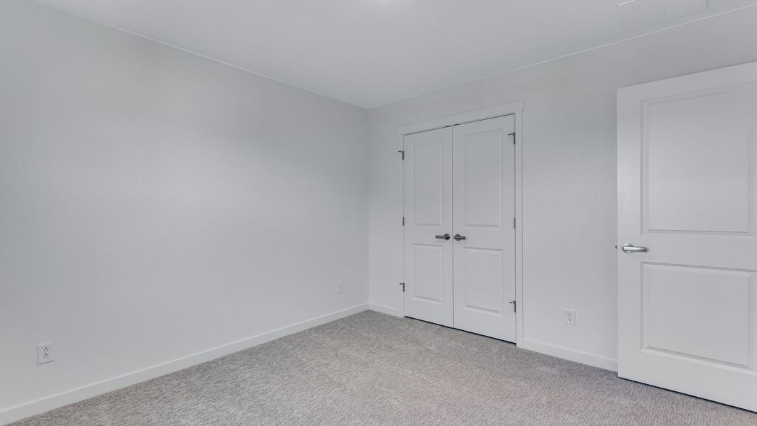 Spacious, unfurnished interior of a new home in Trails at Crowfoot, Parker (Image 18).