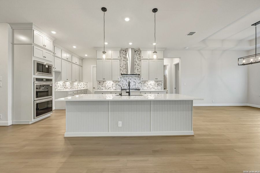 Furnished interior view inside a new home in Megans Landing – Half-Acre Homesites, Castroville (Image 12).