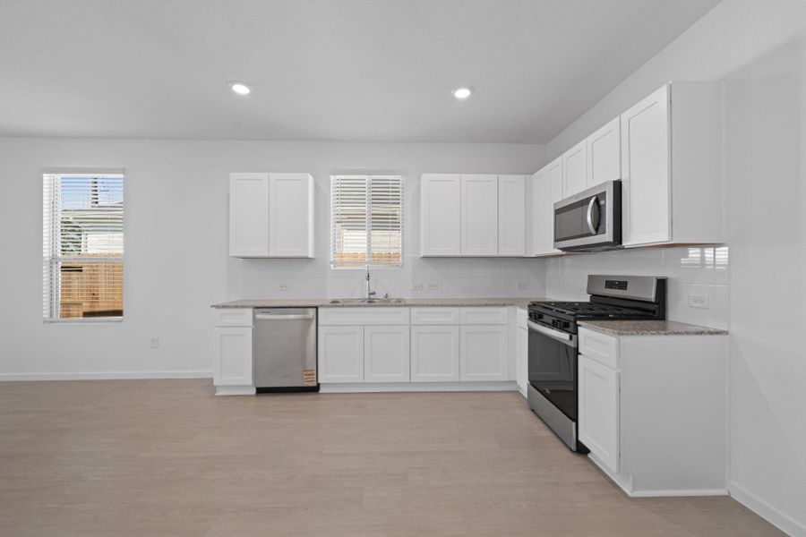 Furnished interior view inside a new home in Crosby Farms, Crosby (Image 7).
