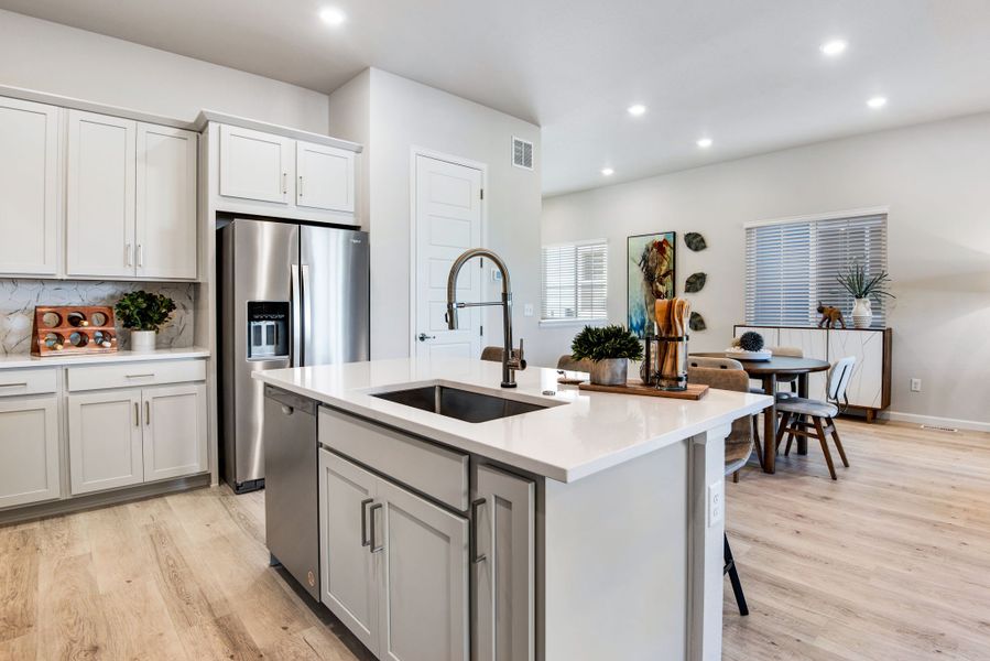 Representative furnished interior of a home built from the 3405 by Tri Pointe Homes in Westside Crossing, Berthoud (Image 9).
