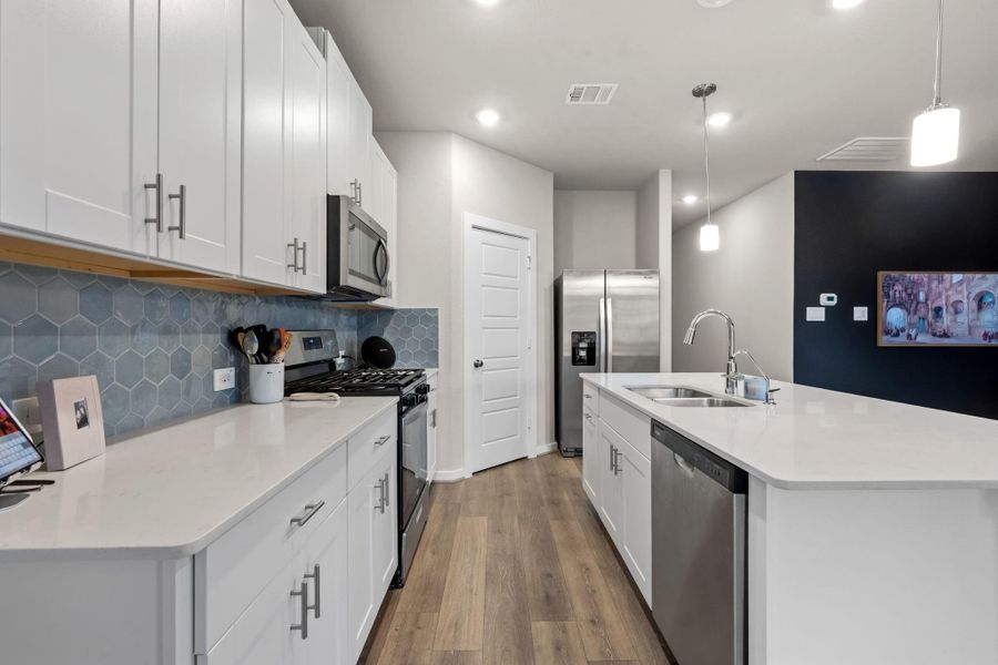 Furnished interior view inside a new home in Heights of Barbers Hill, Mont Belvieu (Image 10).