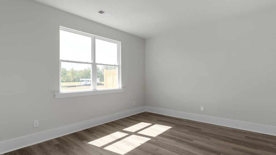 Spacious, unfurnished interior of a new home in Indigo Preserve Townhomes, Leland (Image 15).